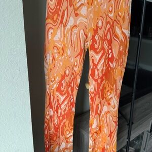 Vibrant Orange Swirl Patterned Pants